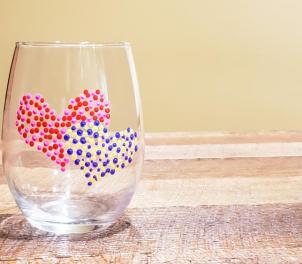 Wine glass with painted hearts