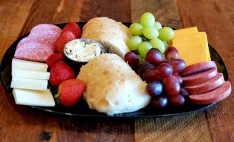 Salami, Assorted Cheeses, Fruit, & Ciabatta Bread with Herbed Butter